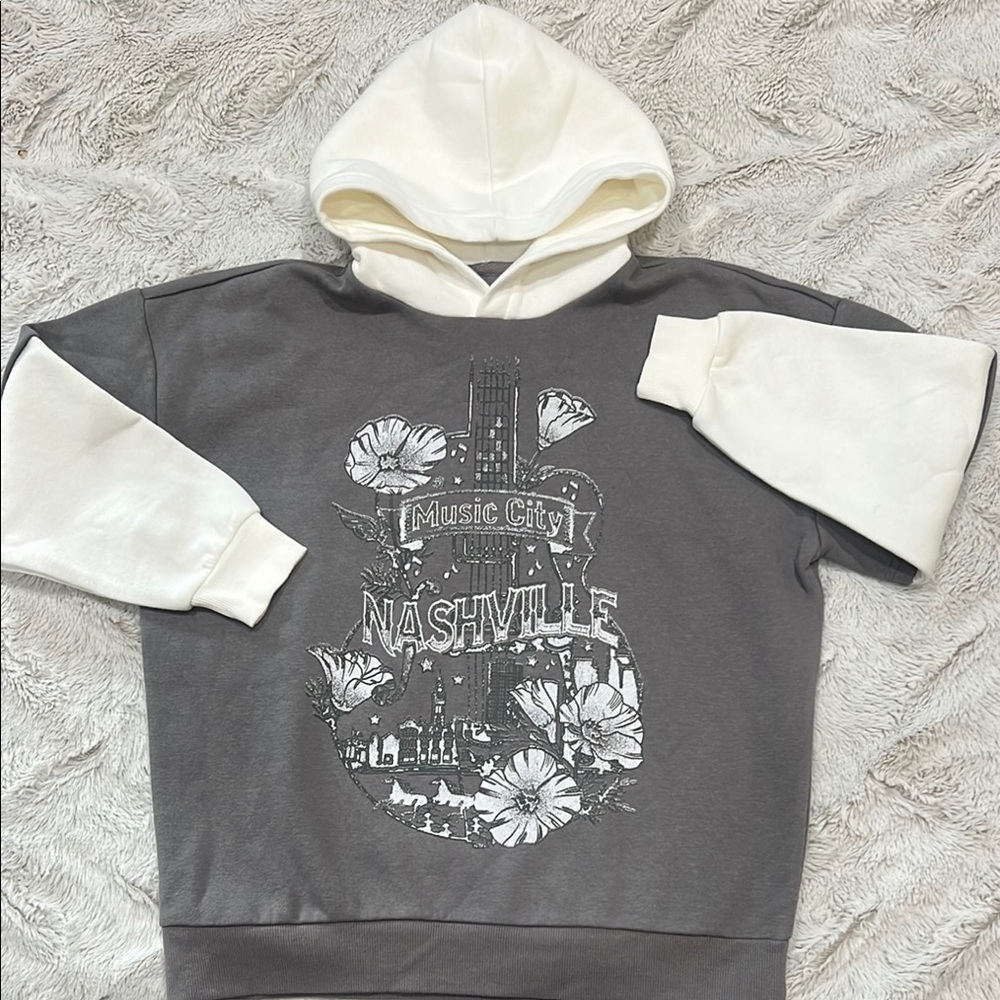 Hoodie by Goodie Two Sleeves. Nashville design, Geat & white 
Girls size S NWOT